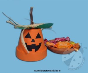 Zucca con vaso di terracotta