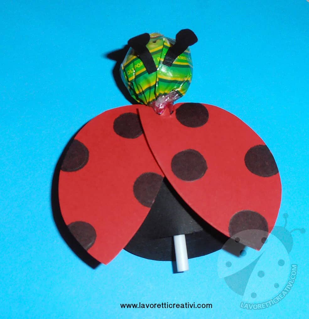 Idee per accogliere i bambini - Coccinella con chupa chups