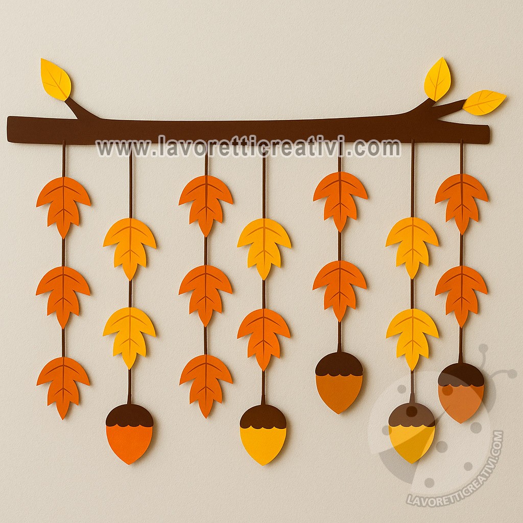 Decorazione con foglie e ghiande in cartoncino colorato appese a un ramo, perfetta per l’autunno.