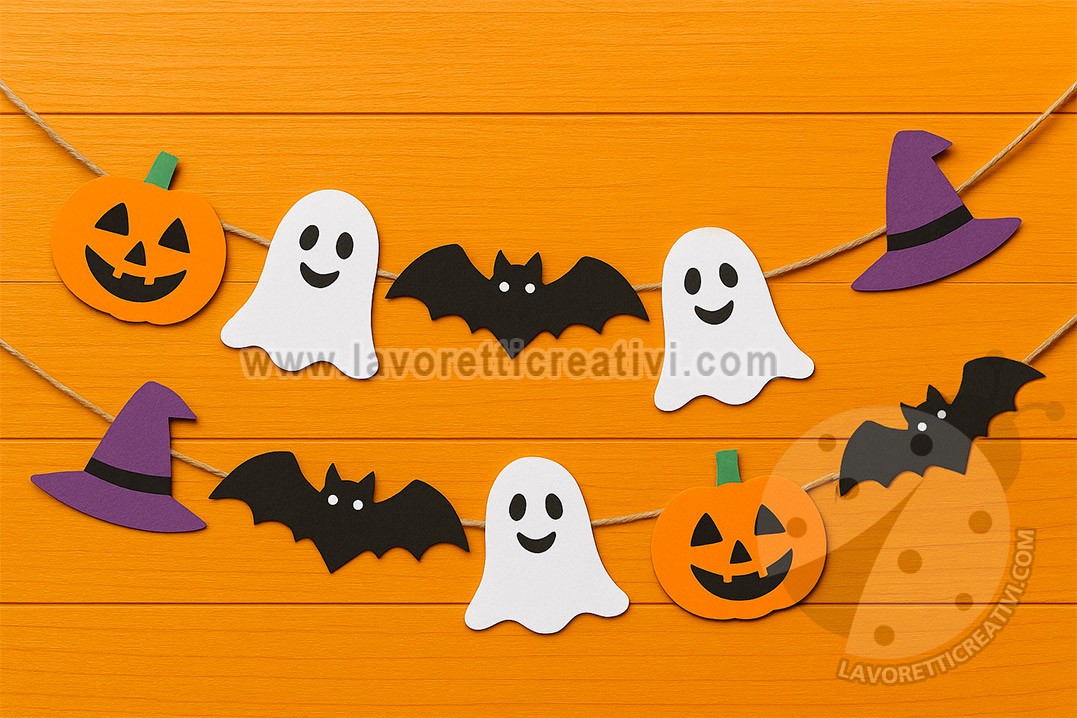 Ghirlanda di Halloween fai da te con zucche, fantasmi, pipistrelli e cappelli da strega realizzati in cartoncino colorato.