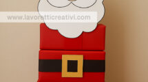 babbo natale con scatole regalo