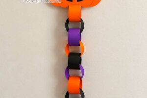zucca di halloween con catenella di carta