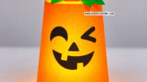 zucca lanterna halloween con bicchiere